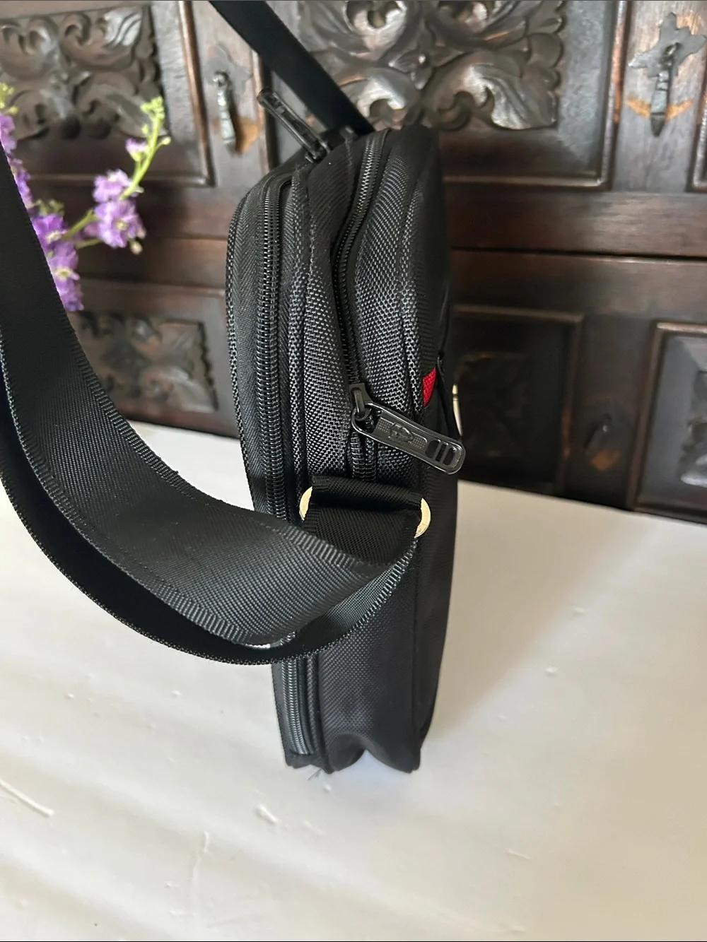 Victoria Tourist Black Messenger Bag with Red Accent Strip